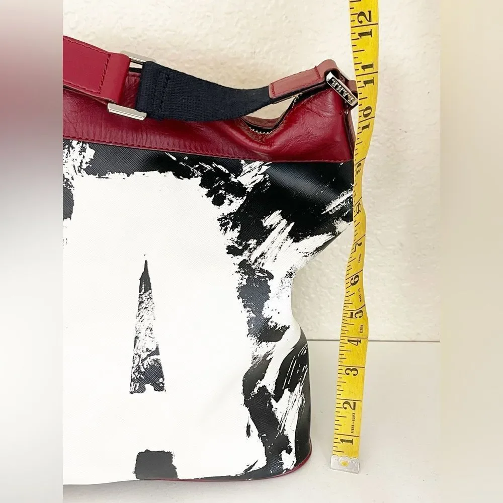 Rare L.A.M.B. Huntley hobo bag by Gwen Stefani, black, white graffiti red trim